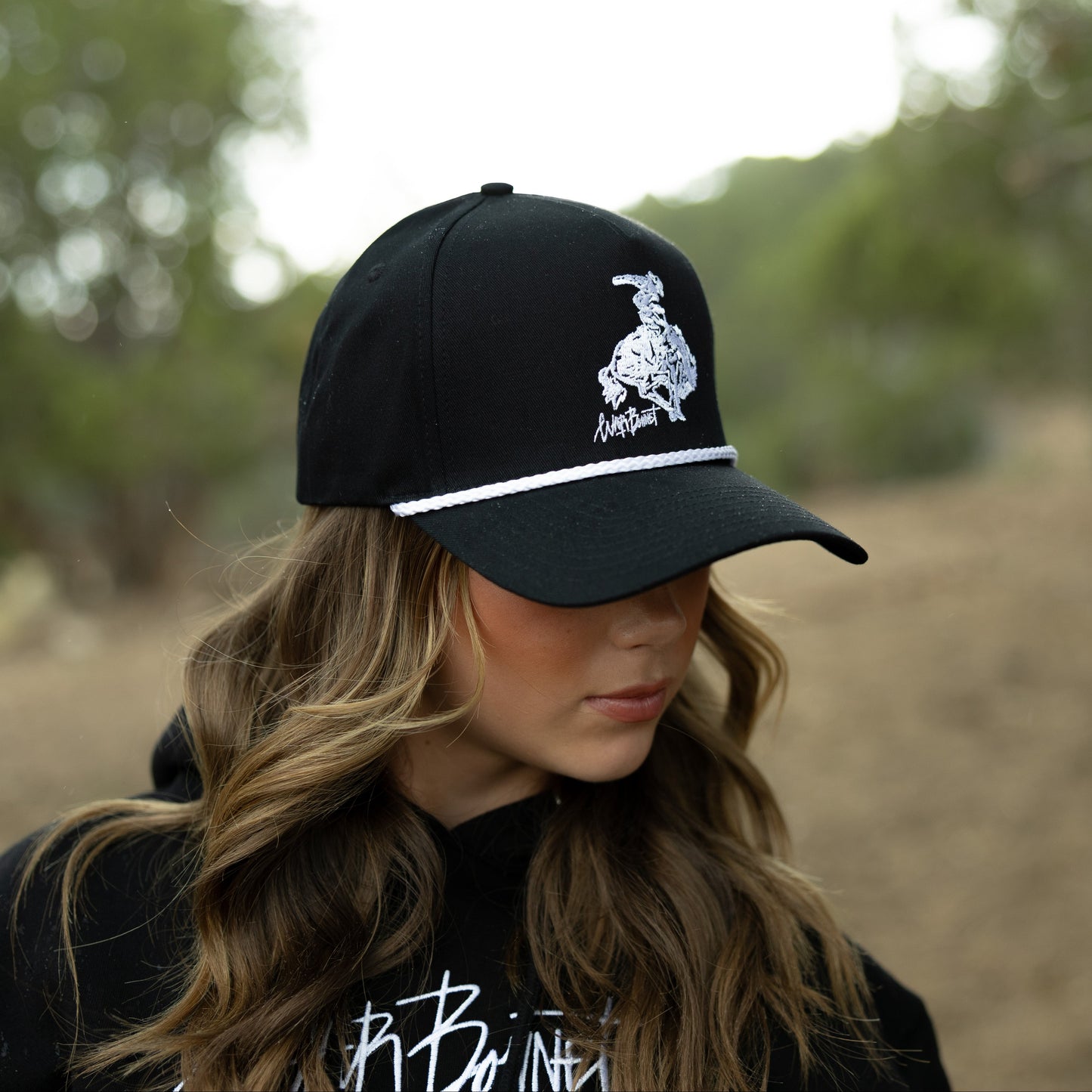 Black Bucking Horse Trucker Hat