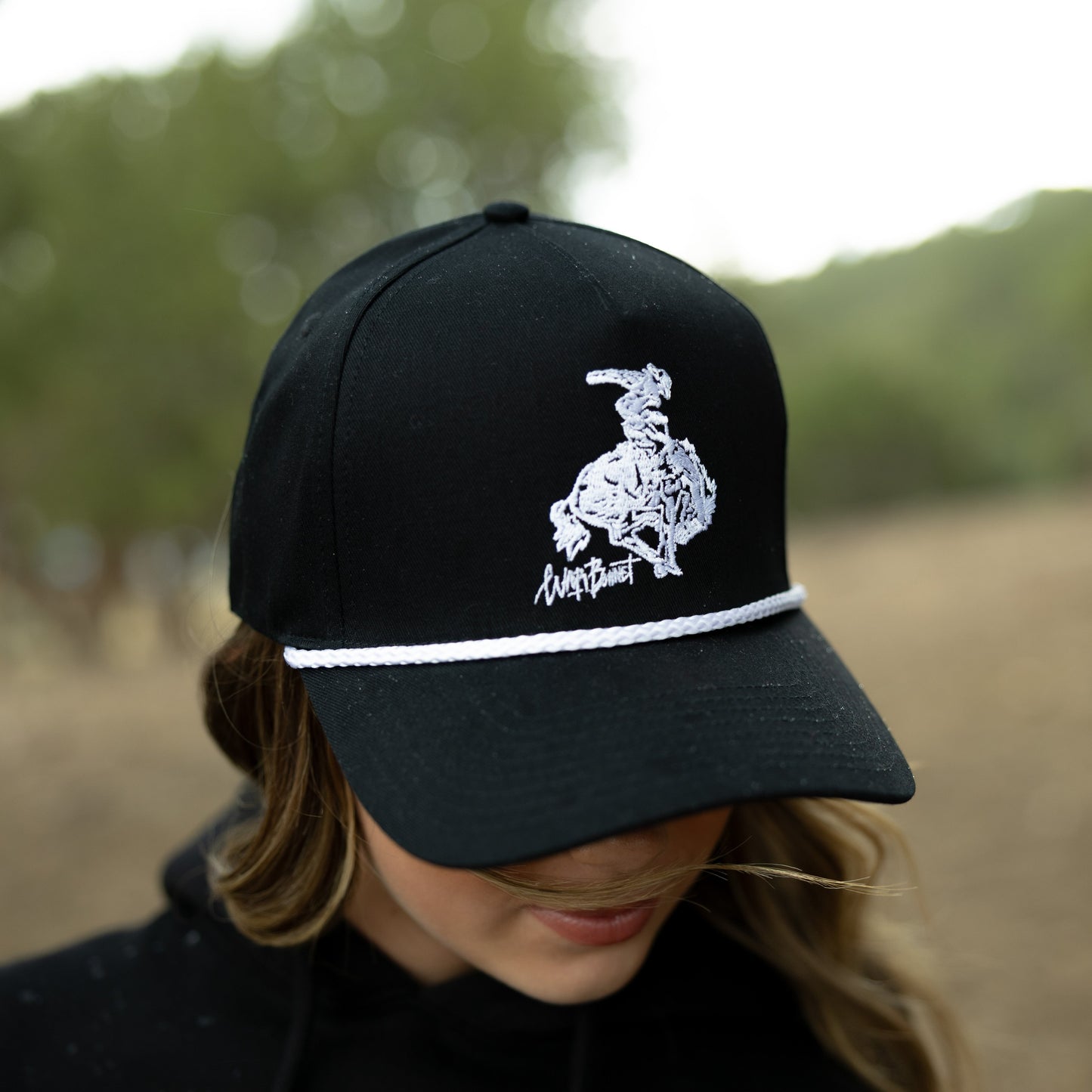 Black Bucking Horse Trucker Hat