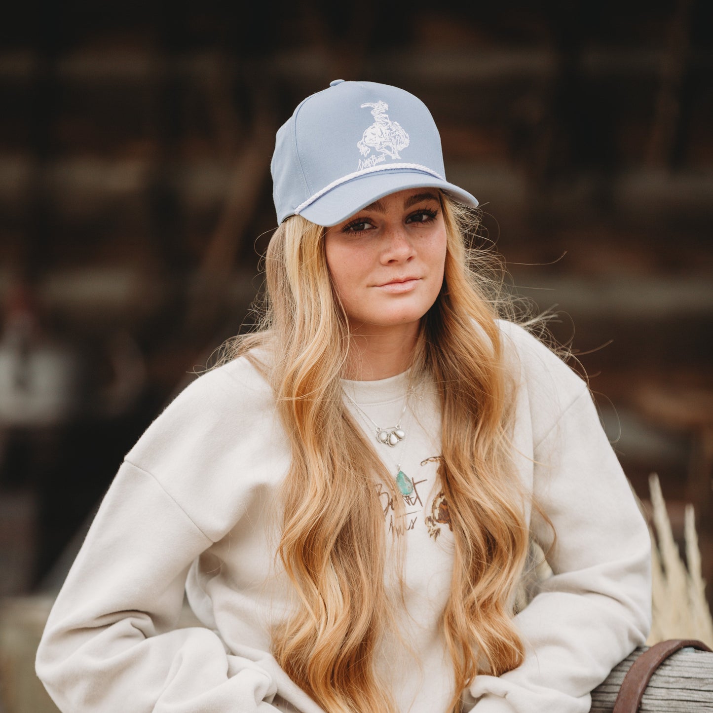 Blue Bucking Horse Trucker Hat